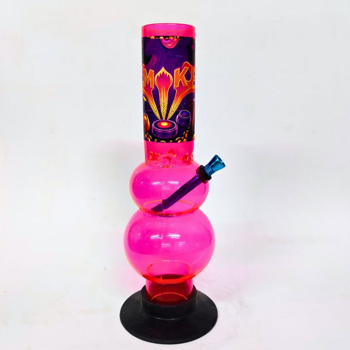 Pink plastic bong with colorful top section on a white background