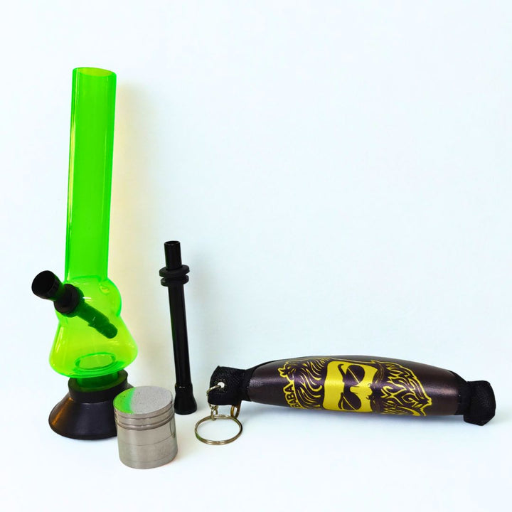 Green Bong with grinder and crushing pouch on a white background