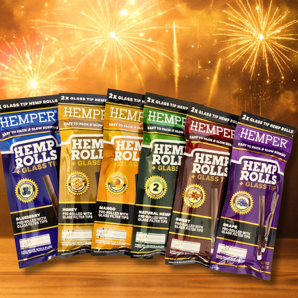 hemper Hemp rolls in 6 Flavours on a wooden surface and fireworks in the background