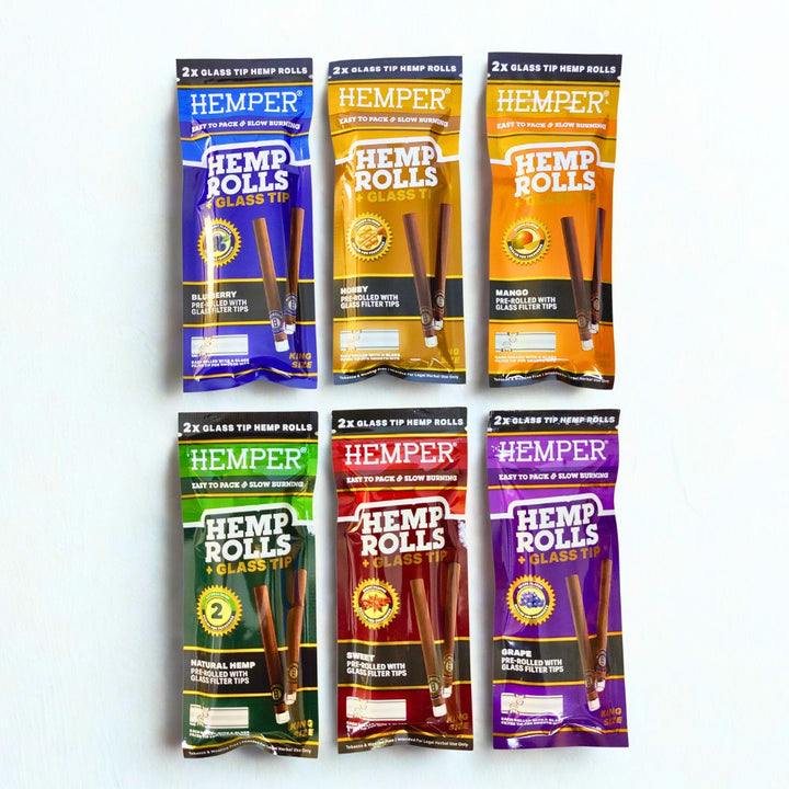 Six packages of Hempers Hemp Rolls with different flavours on a white background