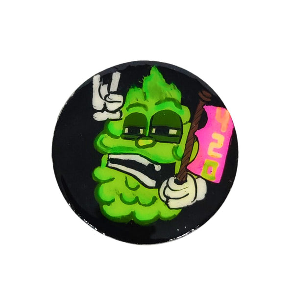Green cartoon character on a Metal grinder 