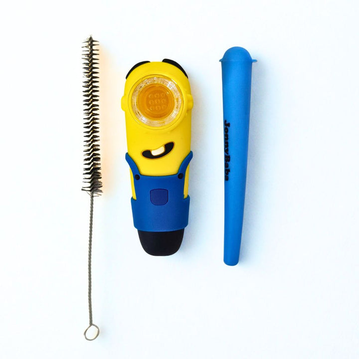 Minion smoking pipe, cleaning brush and doobtube on white background