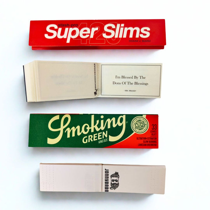 stash pro Super Slims and Smoking Green rolling paper on a white background