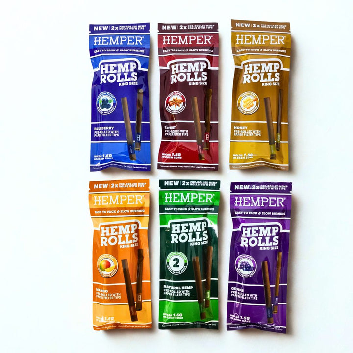 Six packages of Hemper Hemp Rolls in different flavours on a white background