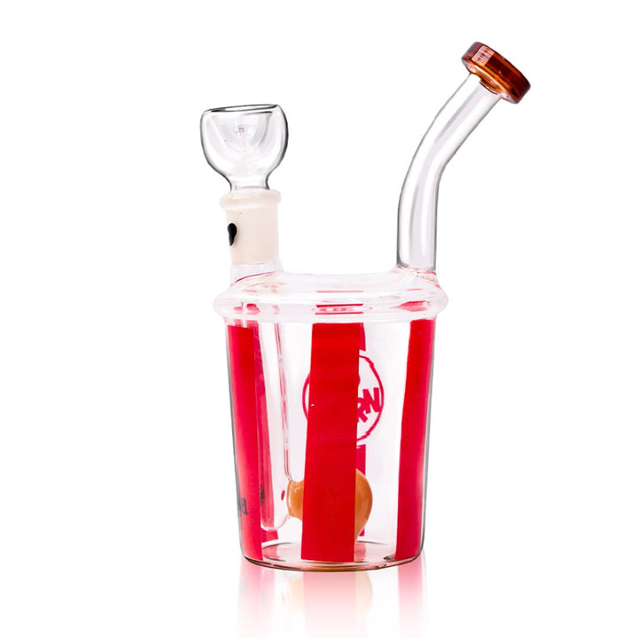 Glass smoking bong with red and white striped container on a white background