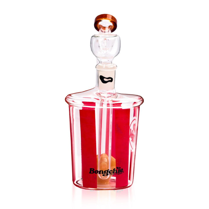 Glass bong with red base and white top on a white background