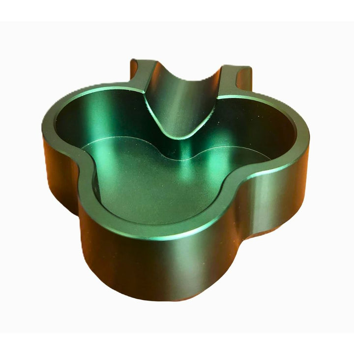 Green metallic ashtray on a white background