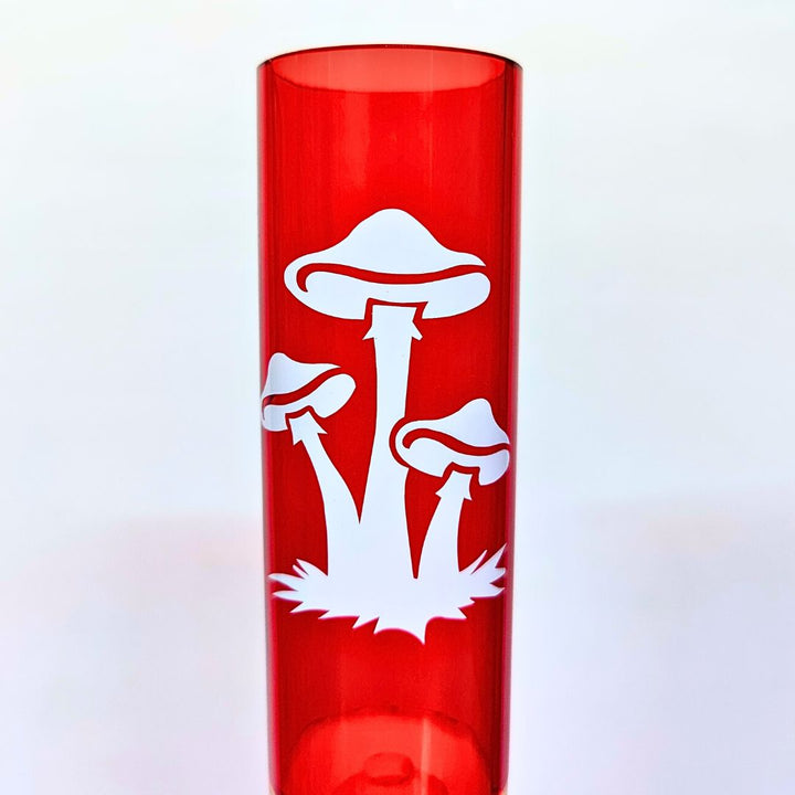 Red bong with white mushroom design on a light gray background