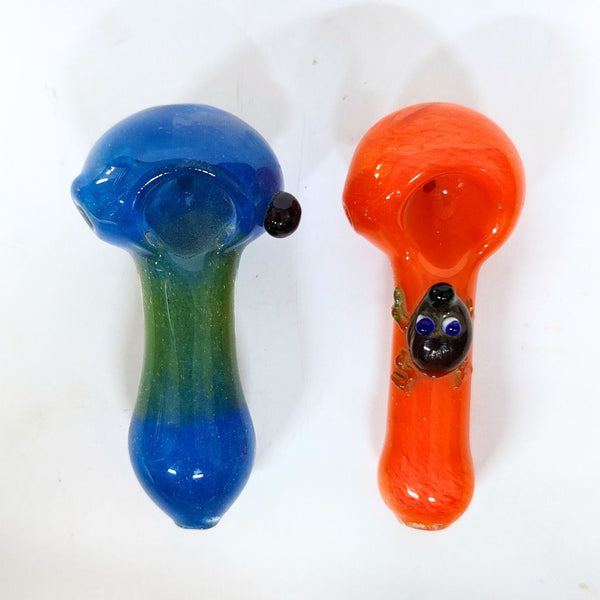 Two glass pipes, one blue and one orange, on a white background