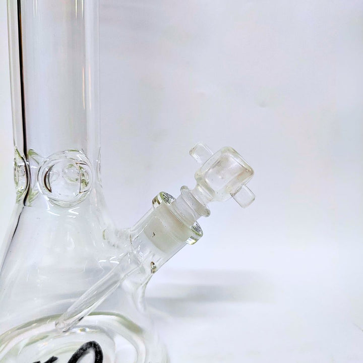 Close-up of a glass bong on a white background