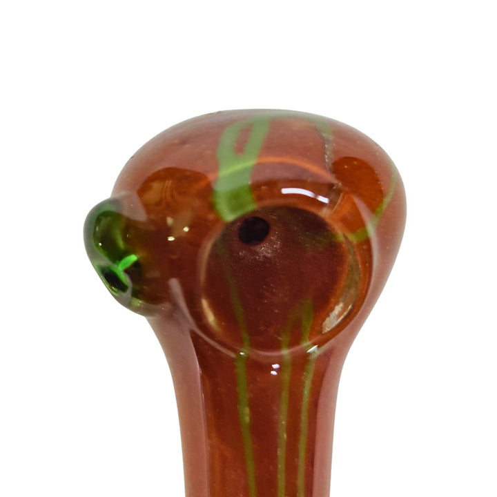 Glass pipe with red and green swirls on a white background