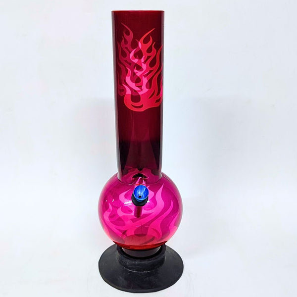 Pink glass bong with flame design on a white background