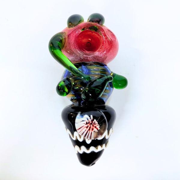 Glass pipe with colorful design on a white background