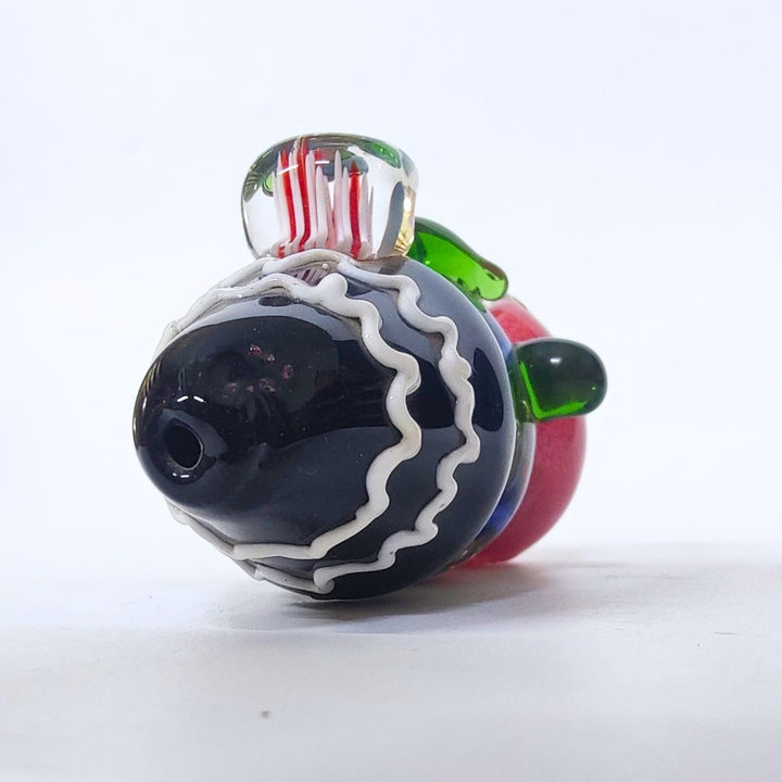 Glass smoking accessory with colorful design on a white background