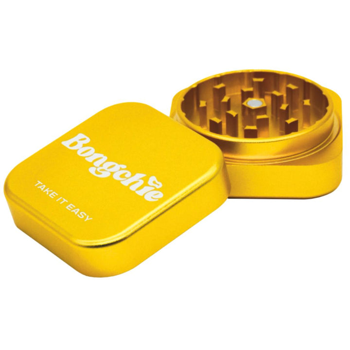 Yellow herb grinder with 'Bongchie' branding on a white background