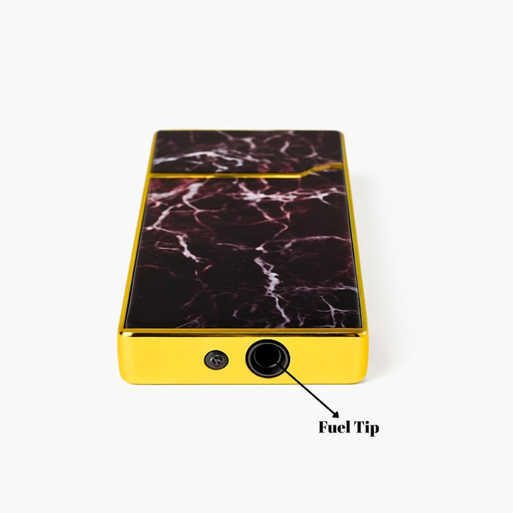 Marble-patterned device with yellow border and fuel tip label on a white background