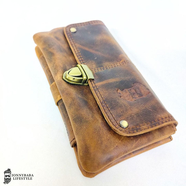 Rolling pouch made of genuine leather with multiple sections