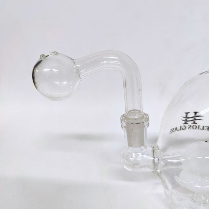 Clear glass small bong with  oil burner pipe on a white background