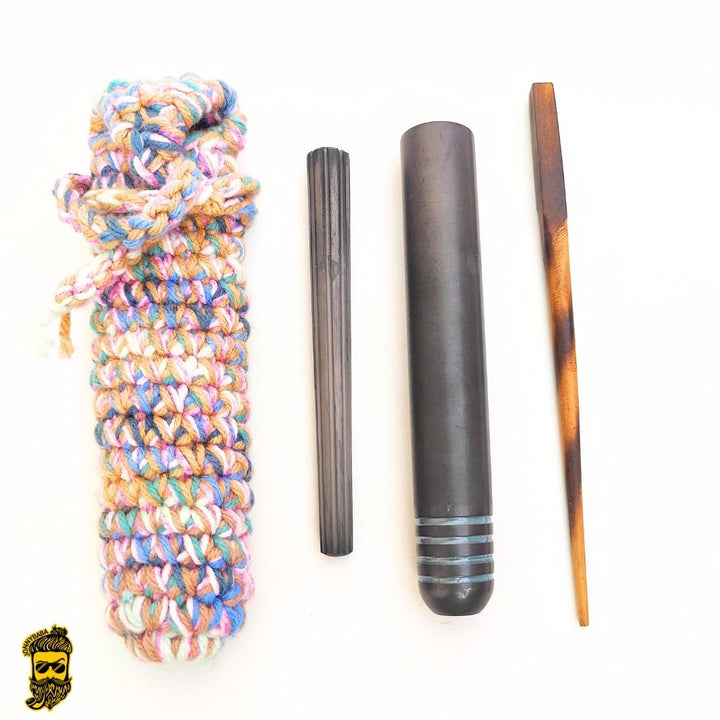 kaio Italian chillum, stone and a wooden cleaning stick with cover on a white background.