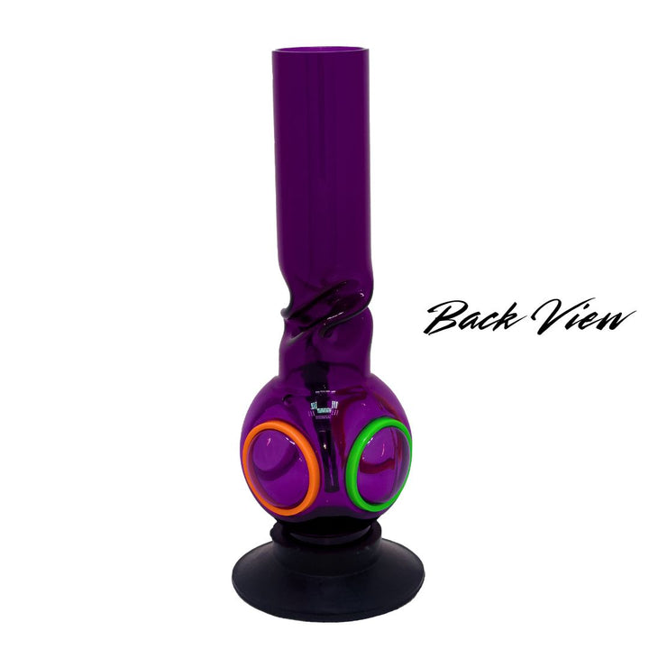 Purple plastic bong with colorful base on a white background