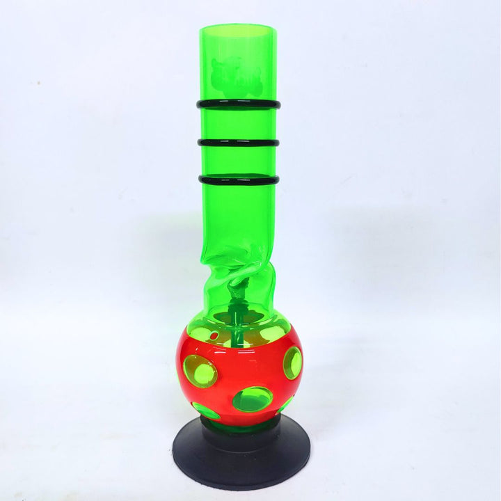 Colorful glass bong with green spiral and red base on a white background