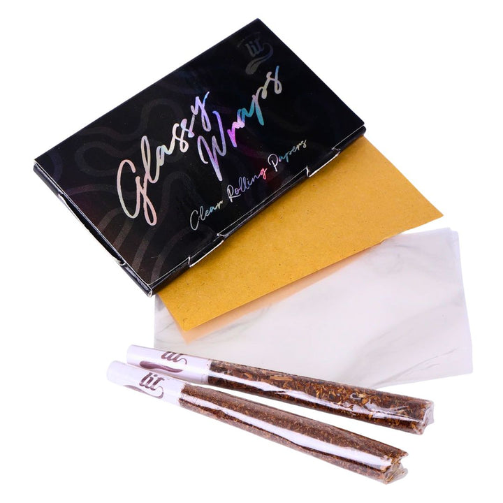 Glossy Wraps clear rolling paper set with packaging on a white background
