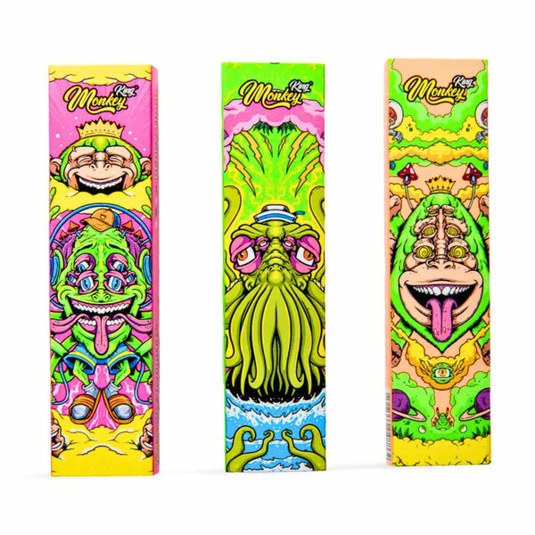 Three colorful packaging boxes with cartoonish monkey designs on a white background