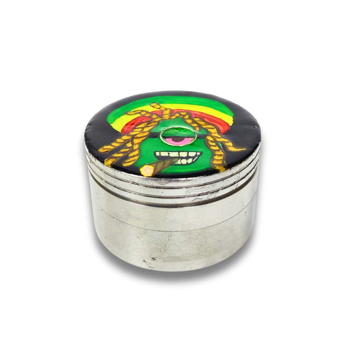 Metallic grinder with colorful top section on a white background