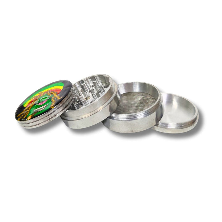 Metallic herb grinder with colorful design on a white background