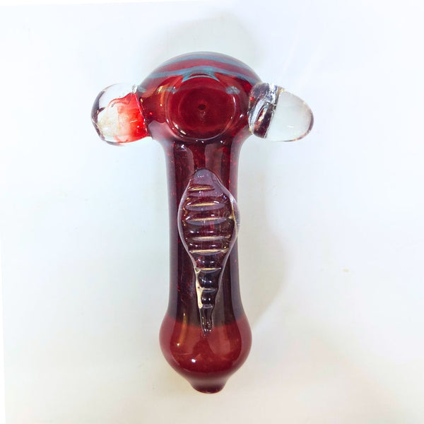 Glass smoking pipe with red and clear design on a white background