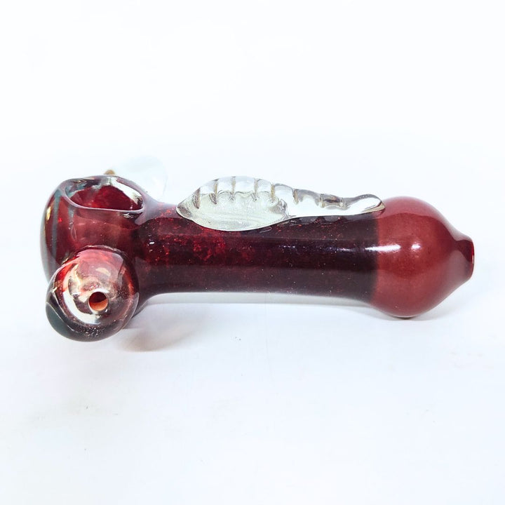 Red glass smoking pipe on a white background