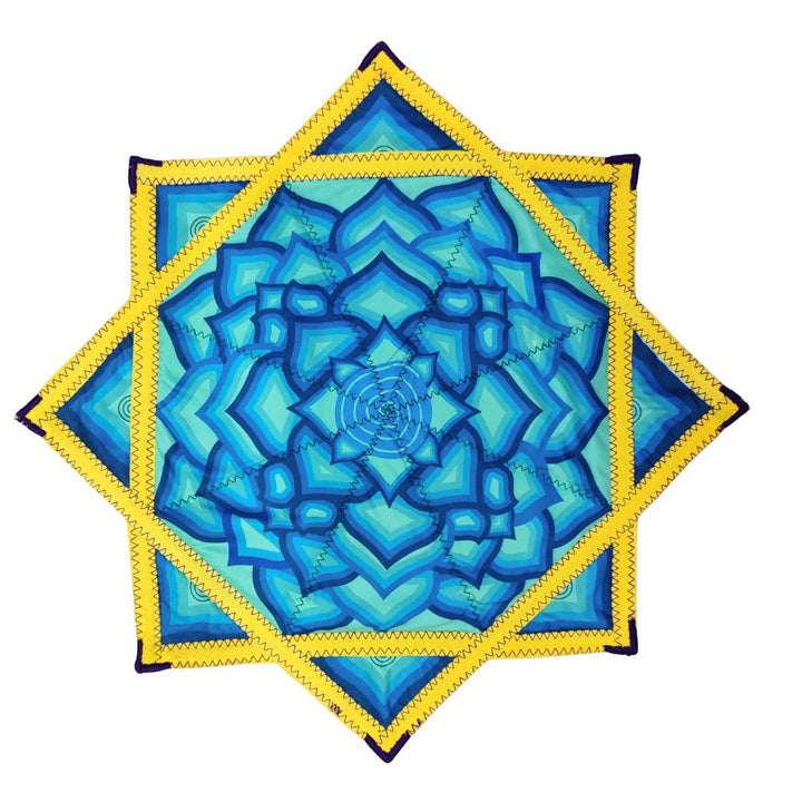 Decorative placemat with blue and yellow mandala design on a white background