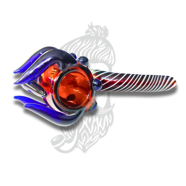 Colorful glass pipe with blue, red, and white design on a white background