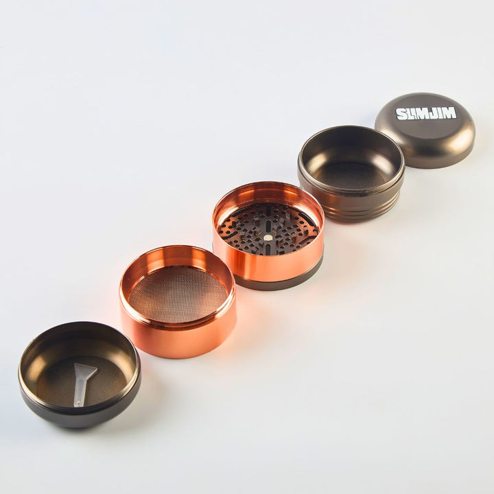 Set of metal grinder parts with 'SIMJIM' branding on a white background