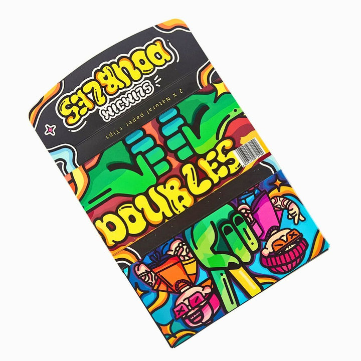 Colorful Paper packaging with 'doubles' text and cartoon characters on a white background