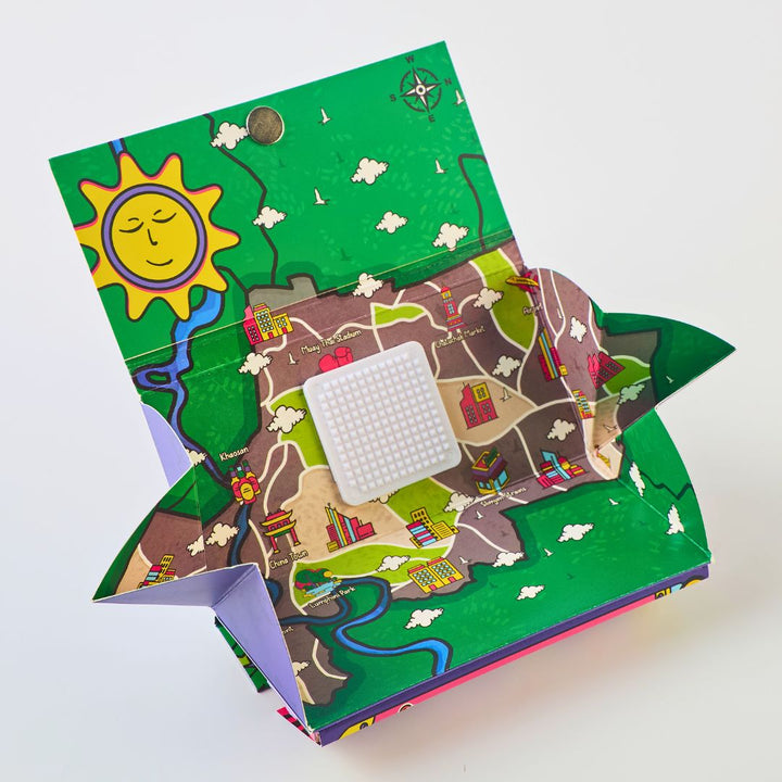 Rolling Paper  book with a map illustration and a sun on a green background