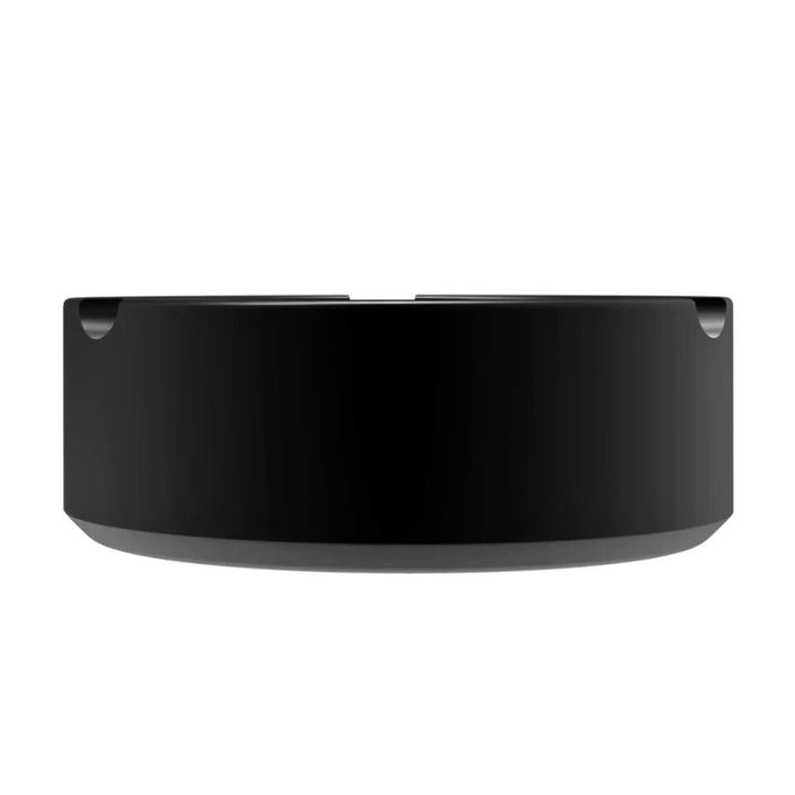 Black circular object on a white background