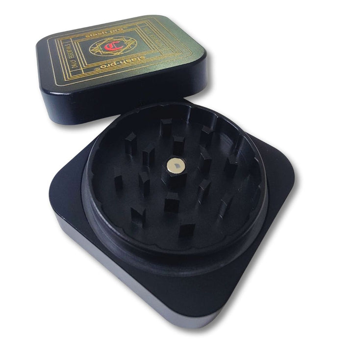 Black metal crusher with a branded box on a white background
