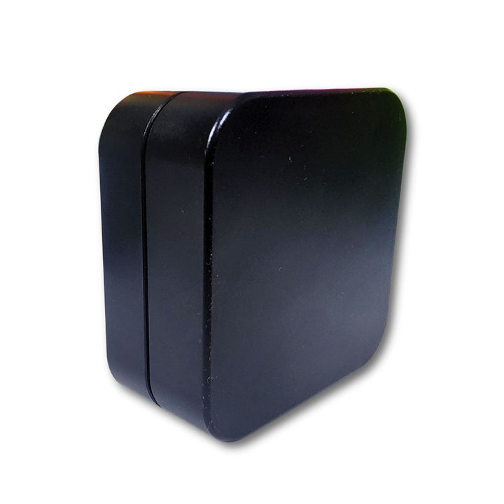 Black rectangular weed grinder on a white background