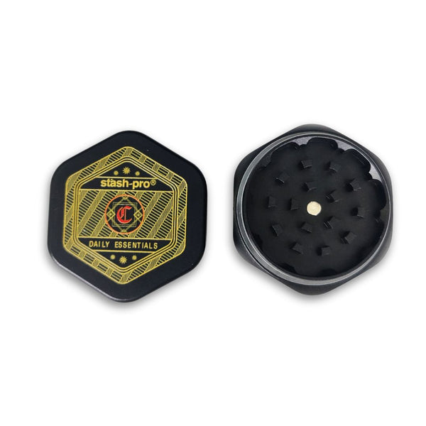 Black and gold grinder with 'stash-pro' branding on a white background