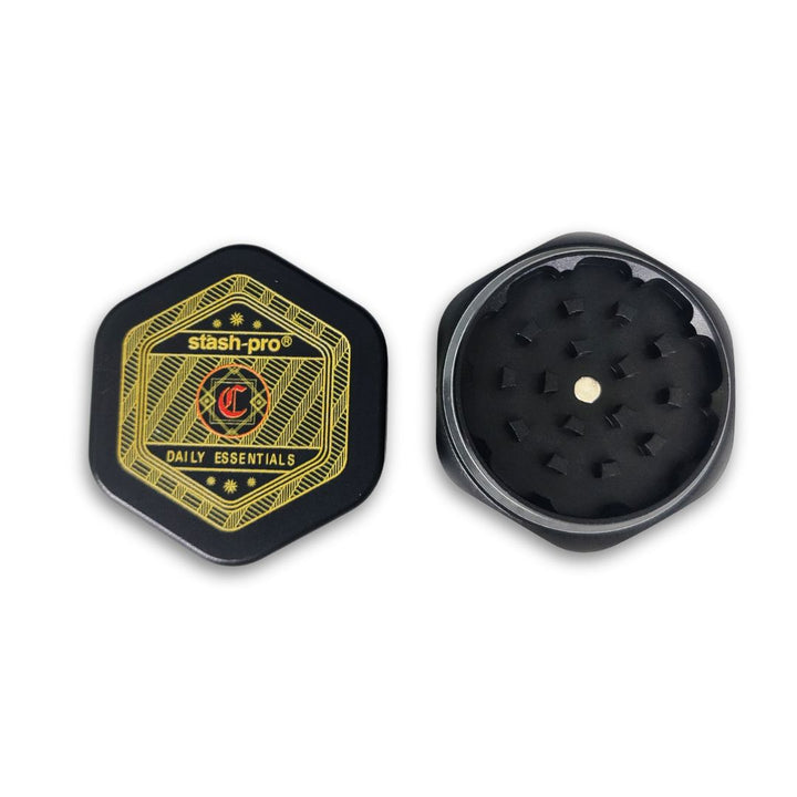 Black and gold grinder with 'stash-pro' branding on a white background