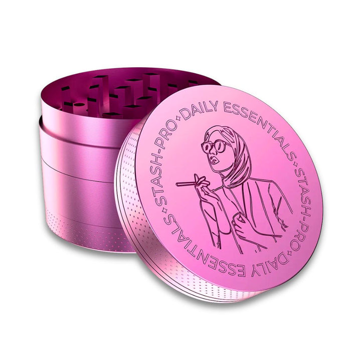 Pink metal grinder with stash pro logo on a white background