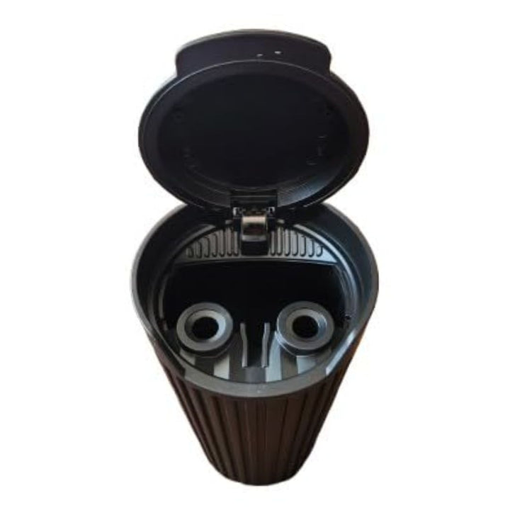 Black air filter with open top on a white background