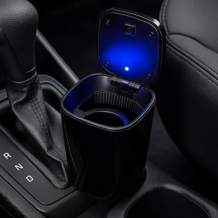 Car cigarette holder with a blue light inside, placed on a car's gear shift.
