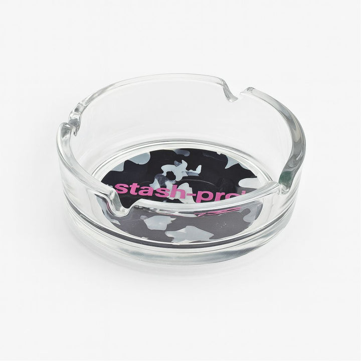 Clear glass ashtray with 'stash-pre' branding on a white background
