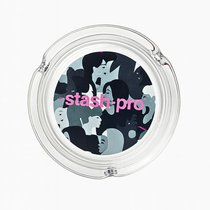 Round clear ashtray with 'stash-pro' logo on a white background