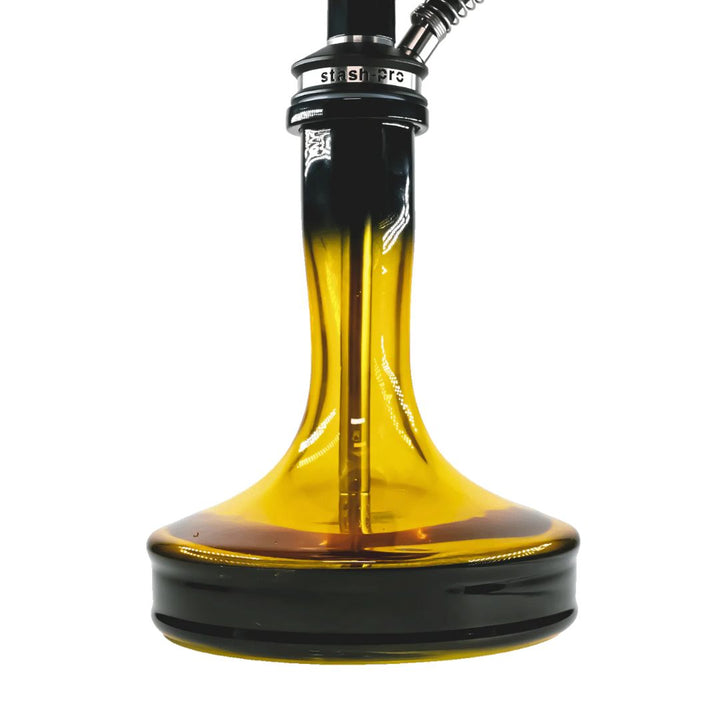 Amber glass bottle with black cap on a white background