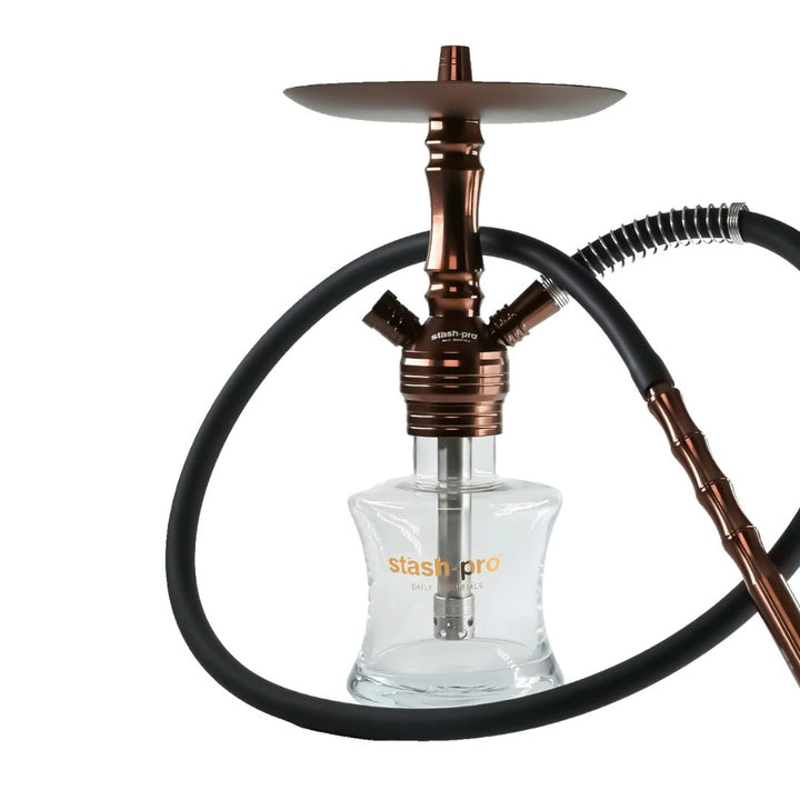 Hookah with copper accents and clear glass base on a white background