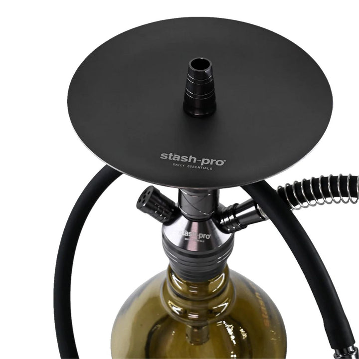 Black 'stash-pro' device attached to a wine bottle on a white background