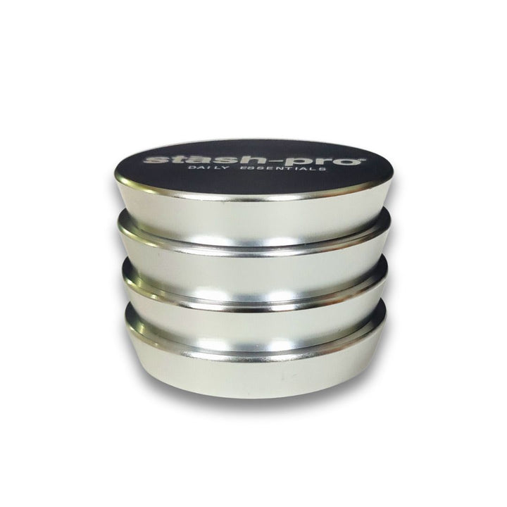 Stack of metallic containers with 'stash pro' branding on a white background